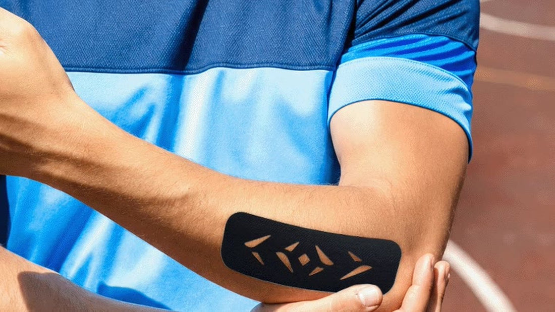 Black Easy Kinesiology Tape pre-cut strip with diamond cut-outs applied to a forearm